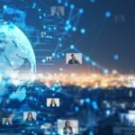 American flag in front of the Brooklyn Bridge and the New York City skyline, illustrating U.S. infrastructure challenges and the aging US power grid in 2026.